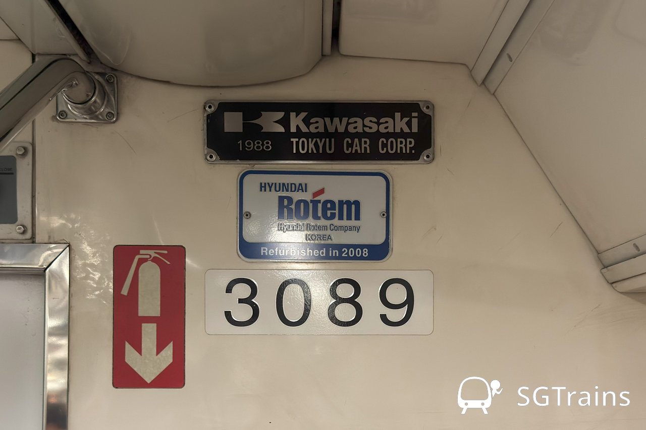The 1st-gen C151 trains' manufacturer's builder plate, with Train 089/090 built by Kawasaki-Tokyu Car Corp. in 1988, and its refurbishment plate, by Hyundai Rotem in 2008